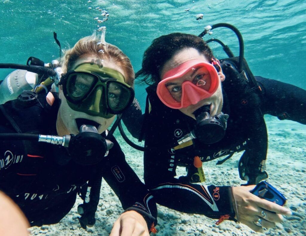 two Broadreach dive instructors underwater